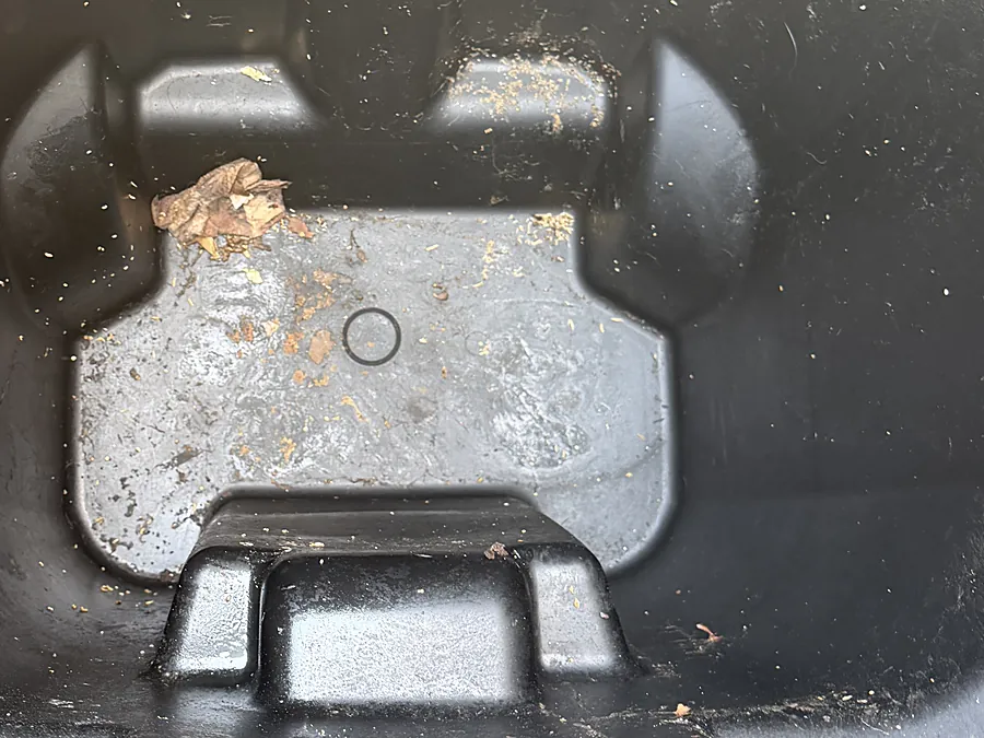 Bin floor & hinge — before a BrightBin clean
